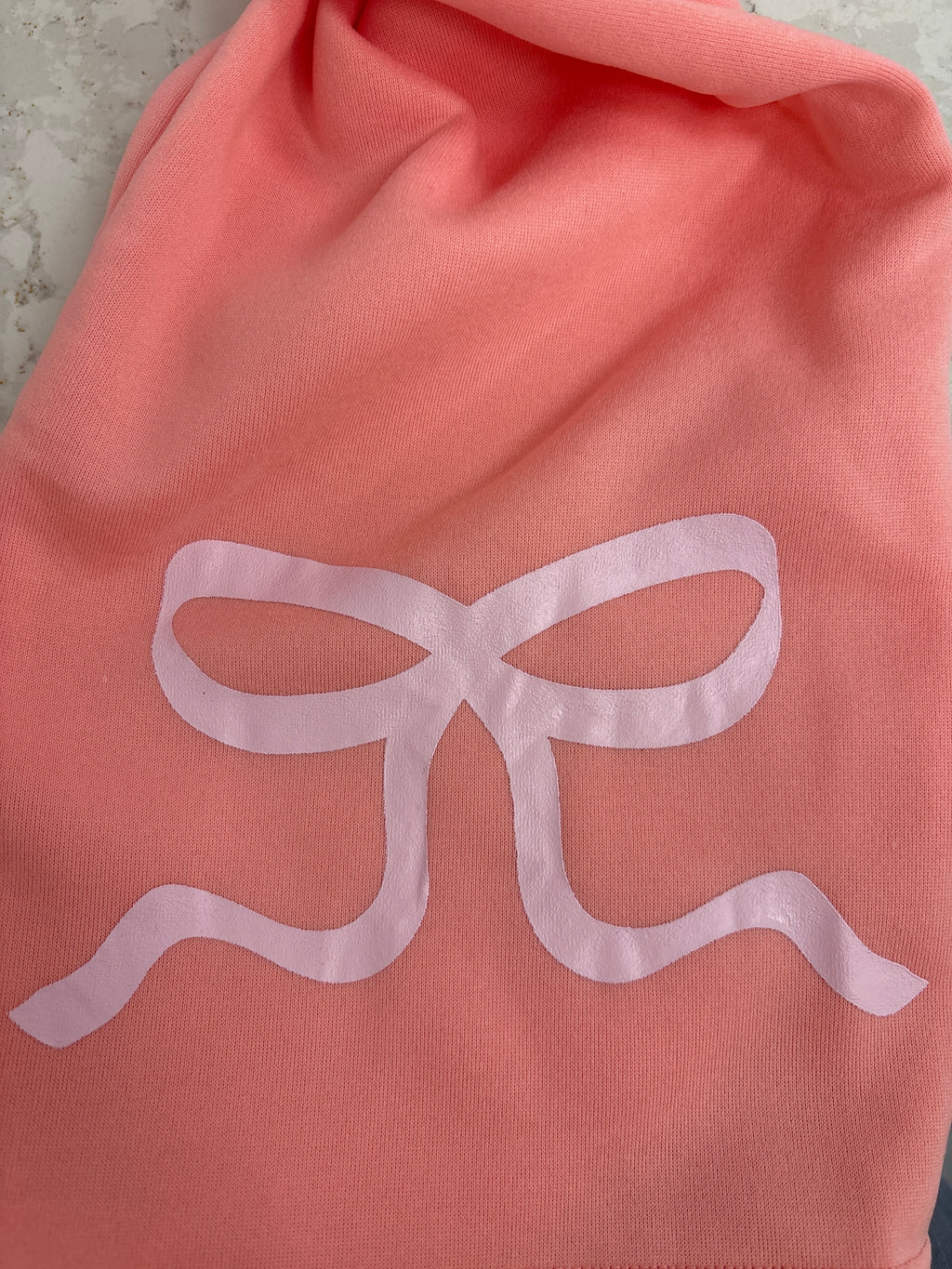 Pink bow sweatset bow detail featured on elbow and back of legs