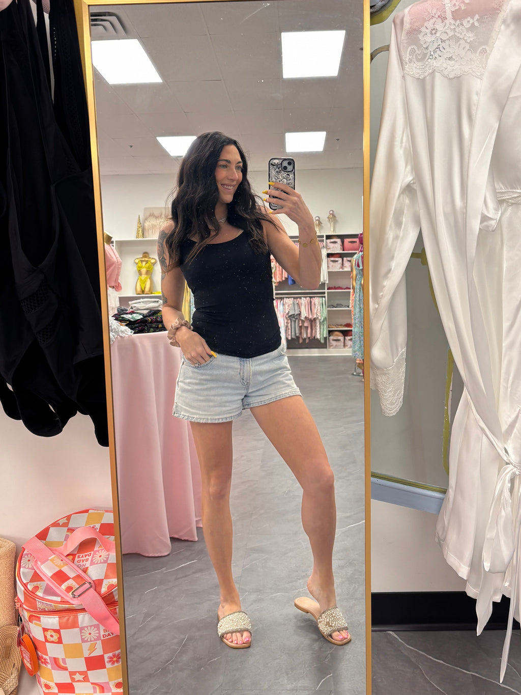 Seamless black camisole tank top on model full look