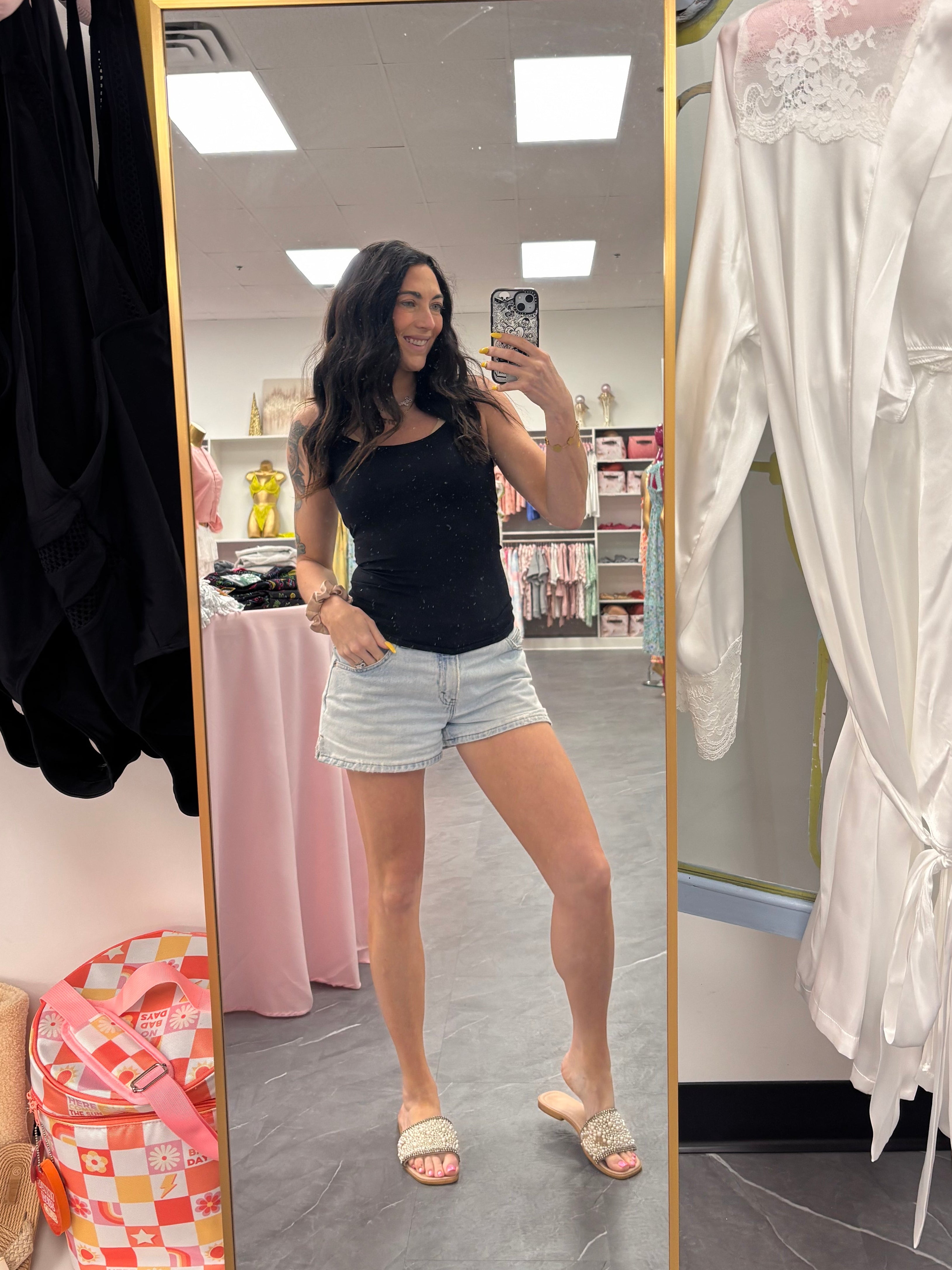 Seamless black camisole tank top on model full look