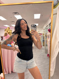 Seamless black camisole tank top on model