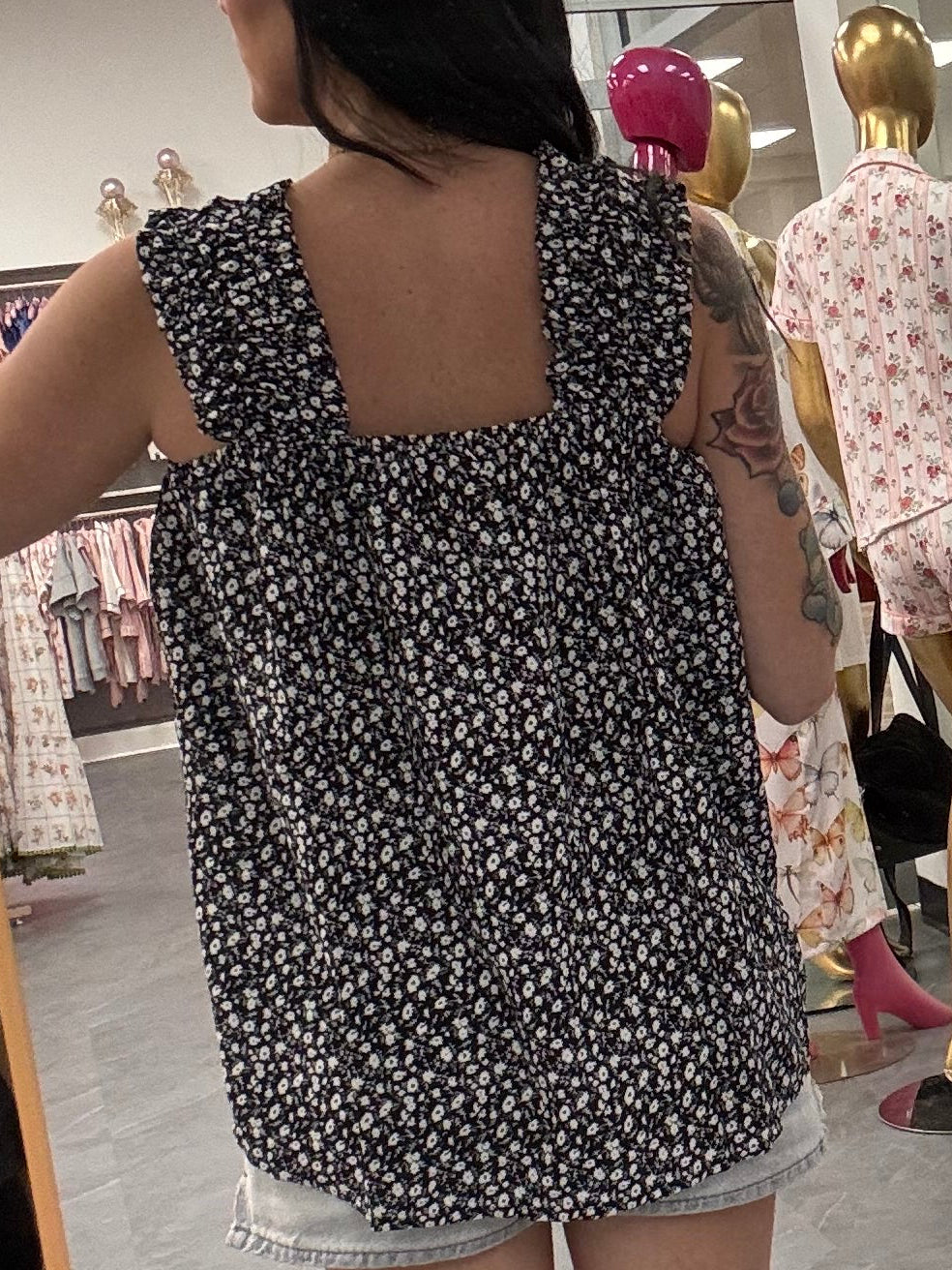 Women's black flowy floral tank top back