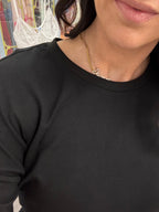 Women's classic black t-shirt close up detail