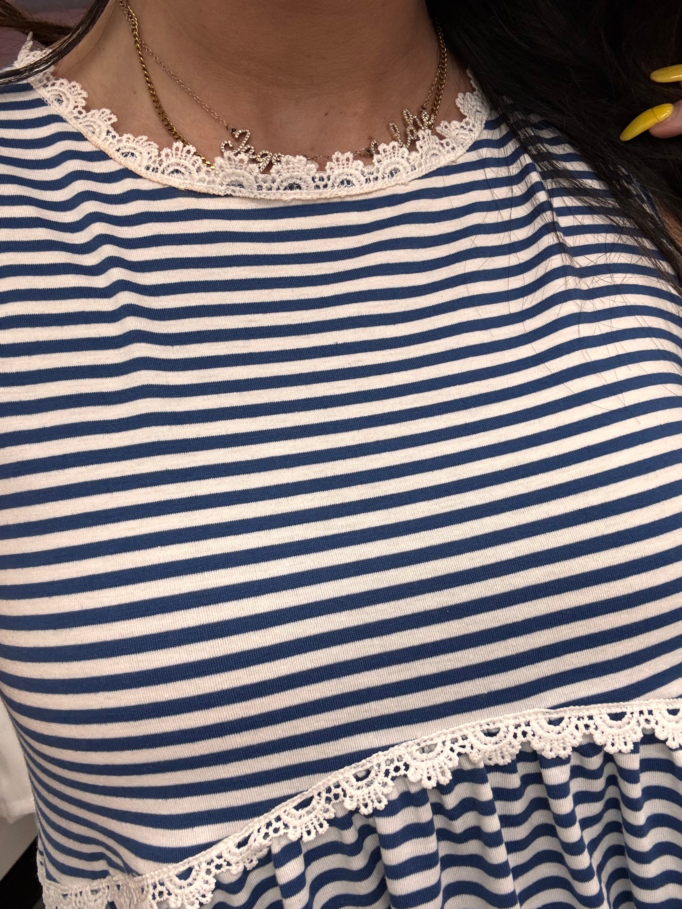 Women's blue peplum striped top details