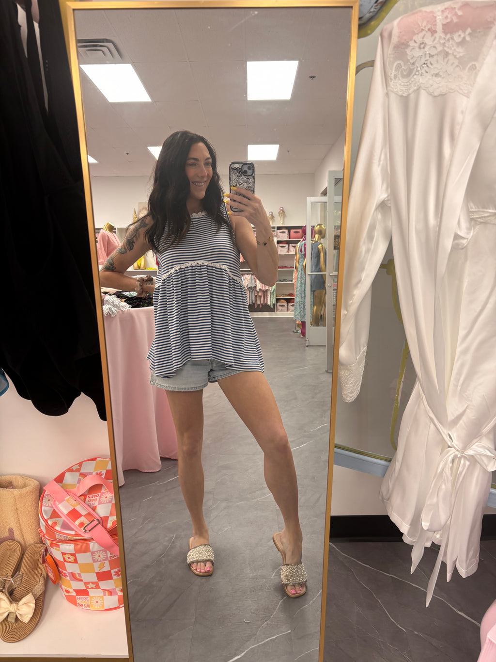 Women's blue striped peplum top full model