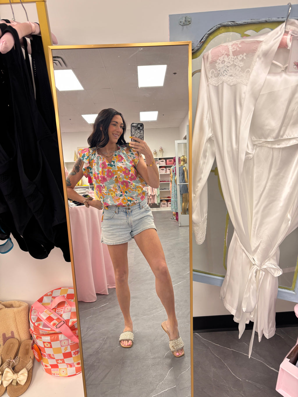 Womens flowy boho floral tank top tucked in on model
