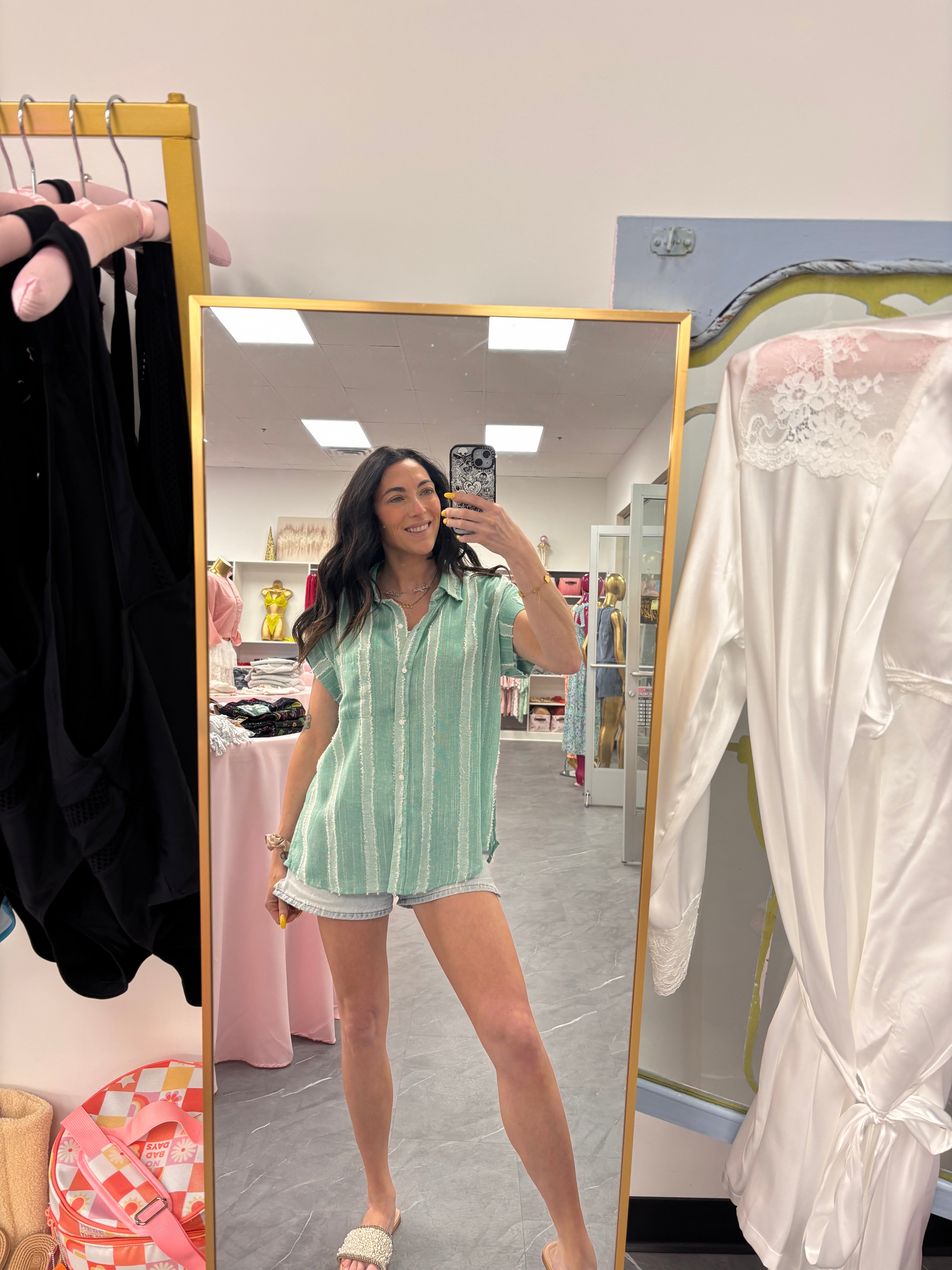 Women's frayed mint button up worn buttoned on model