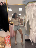 Women's floral ruffle vneck top on model full 