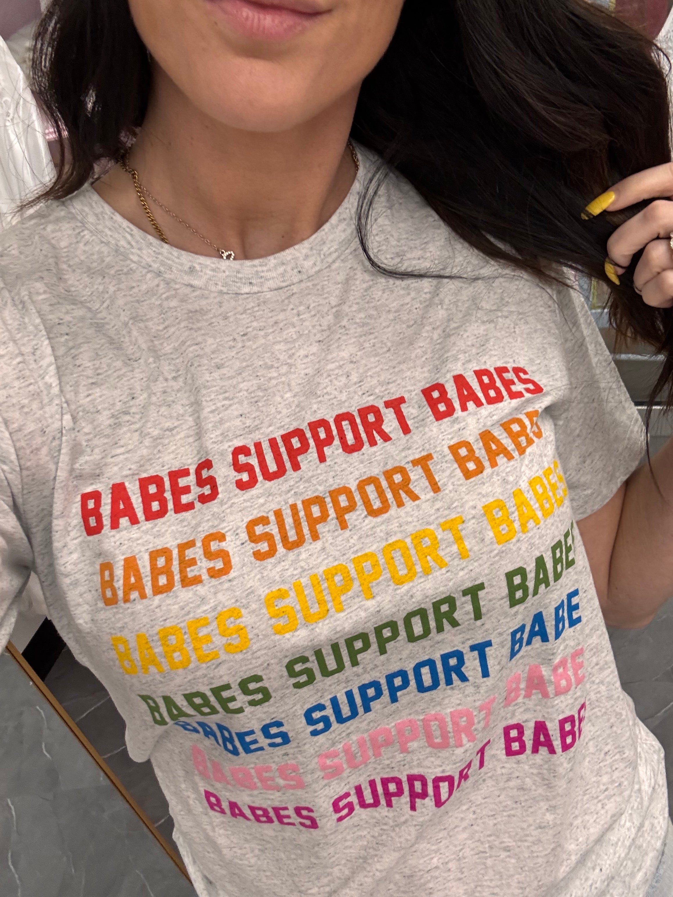 Women's grey t-shirt "babes support babes" close up detail