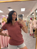 Women's mauve vneck waffle shirt with lace sleeves on model close up