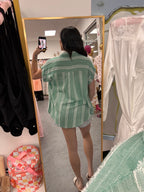 Women's frayed mint button up back detail on model