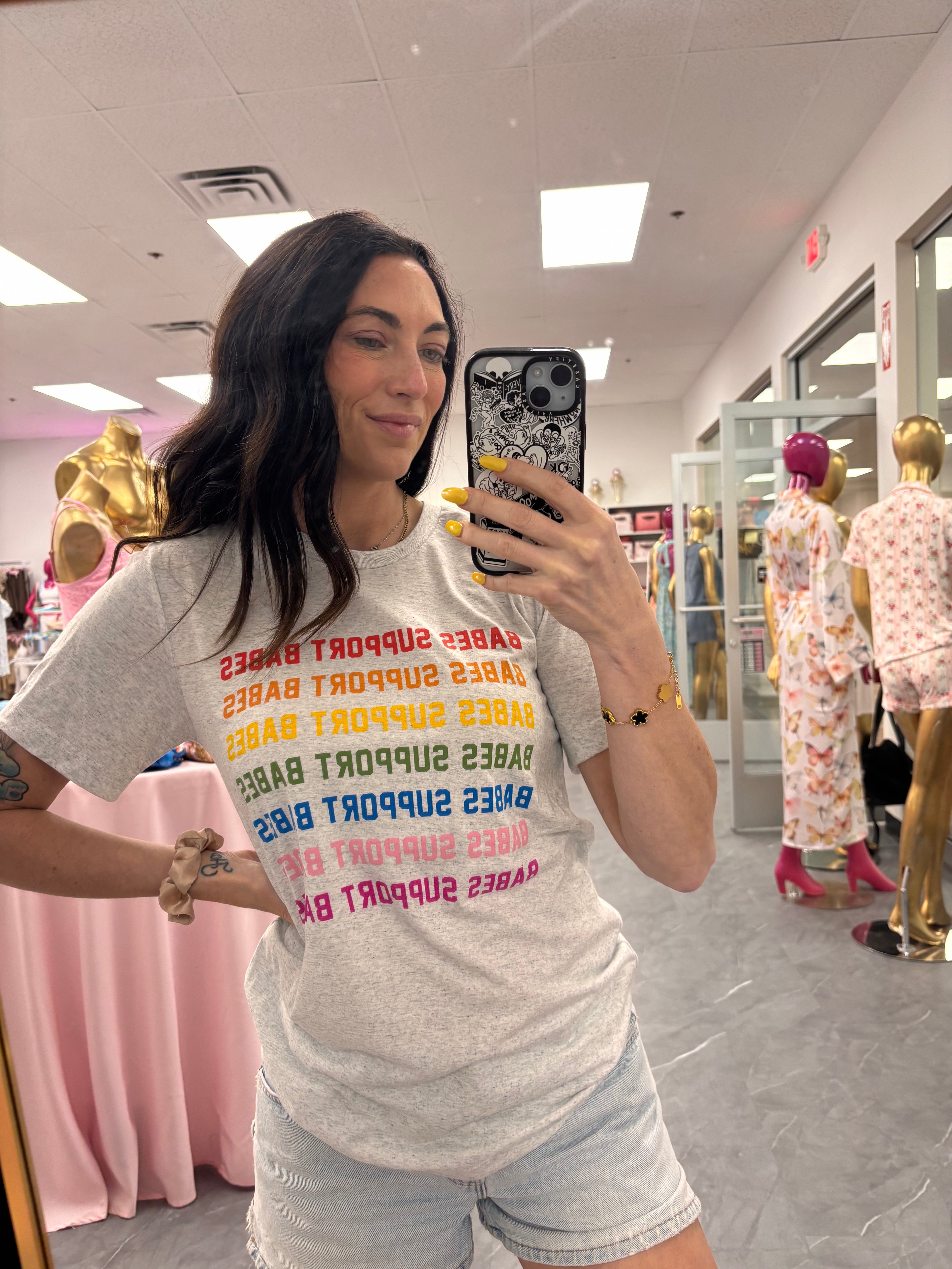 Women's t-shirt with "Babes Support Babes" in rainbow font