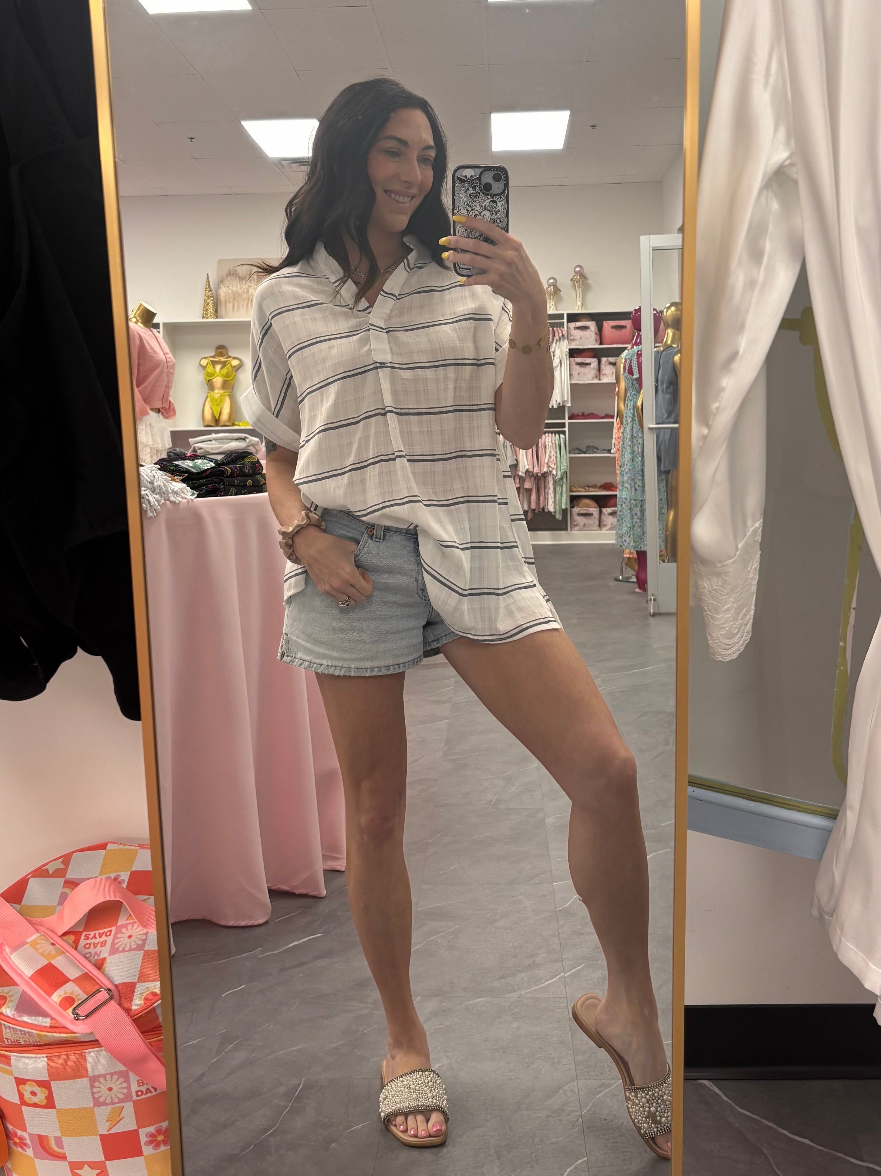 Women's white striped relaxed shirt full body 