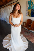 Womens adhesive reusable sticky bra nude with front clasp on model with wedding dress