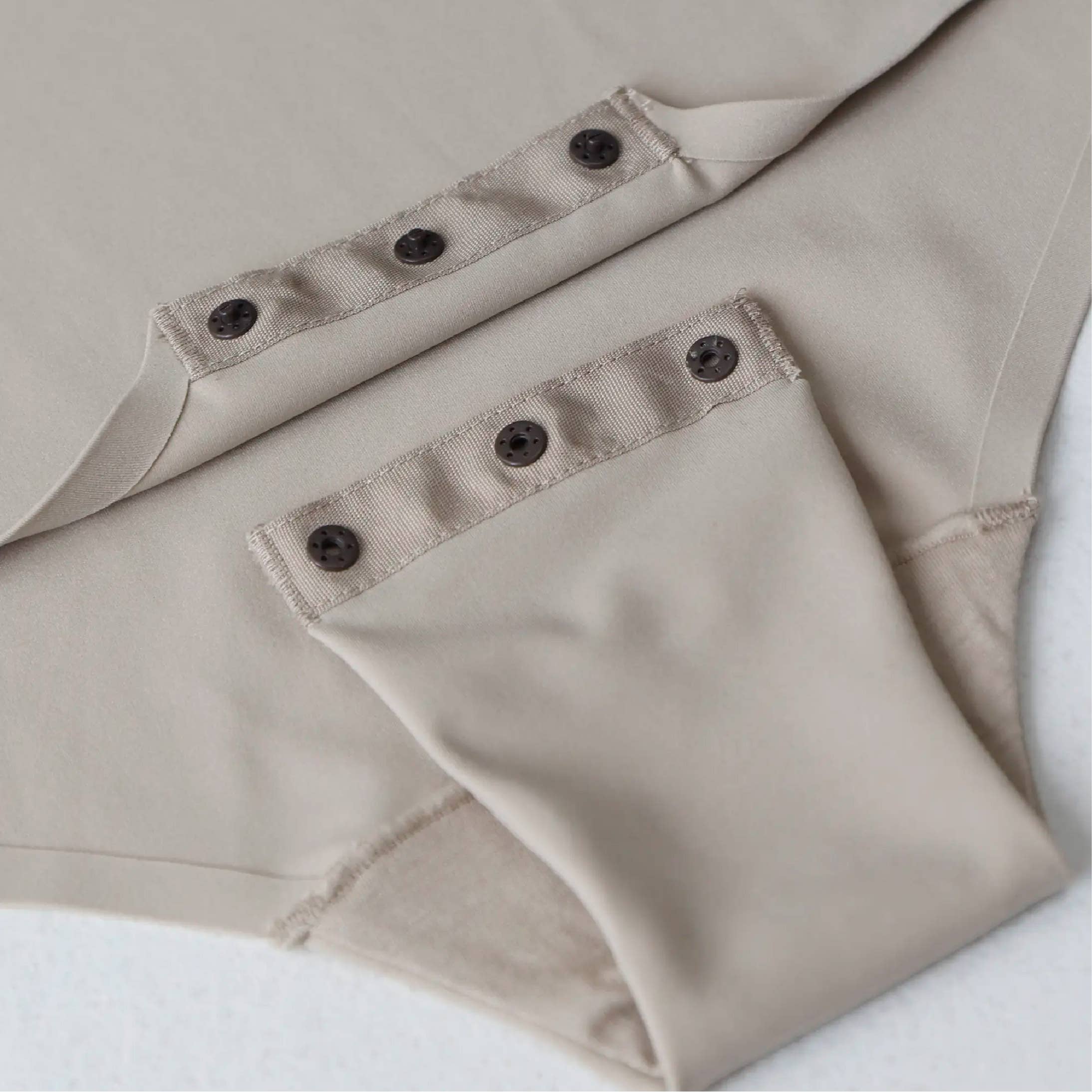 Women's seamless beige crew neck tshirt style bodysuit on model 