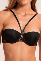 Women's black strapless bra with straps to wear multiple ways on model front