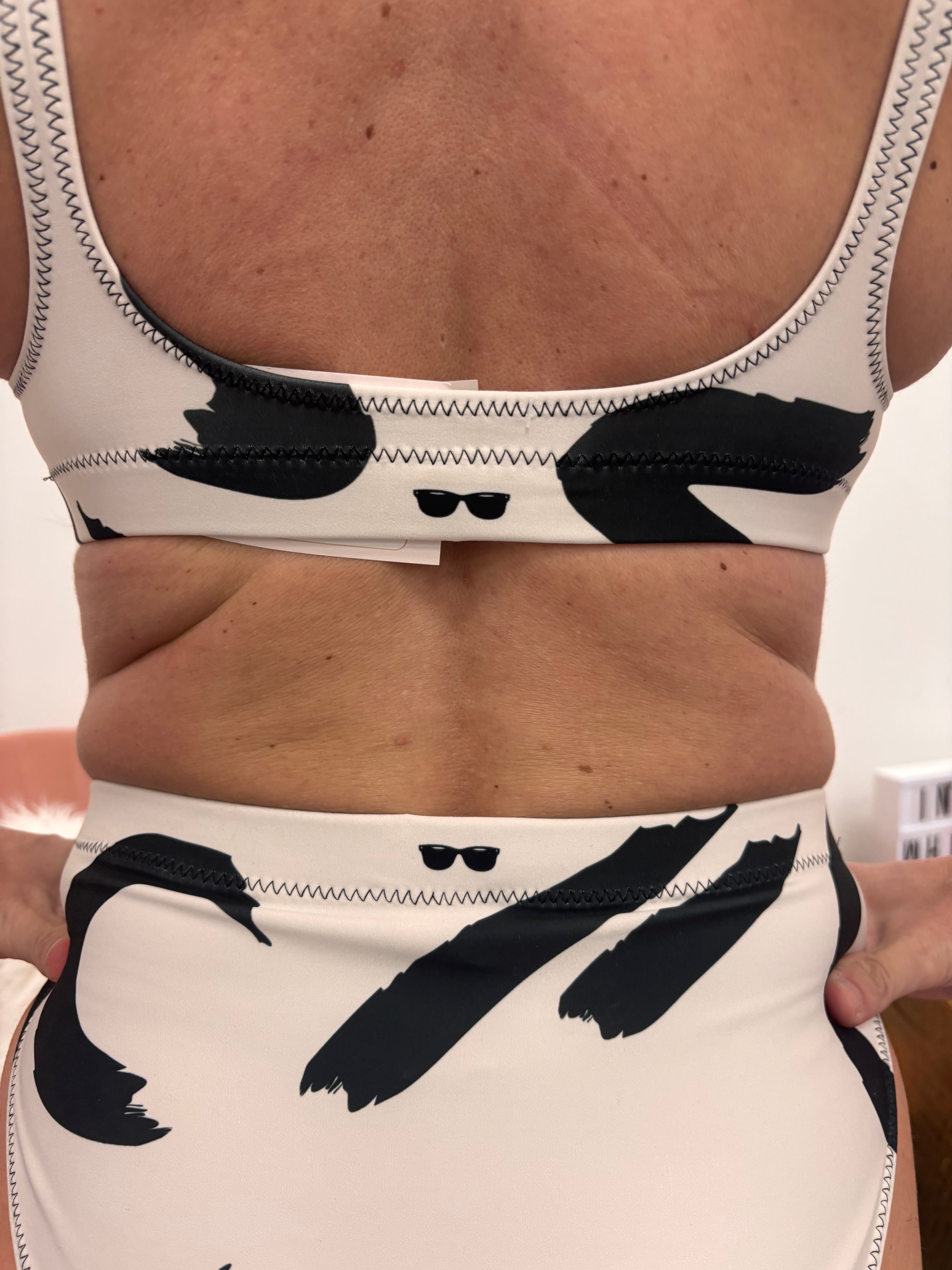 Women's black and white high waisted bikini model