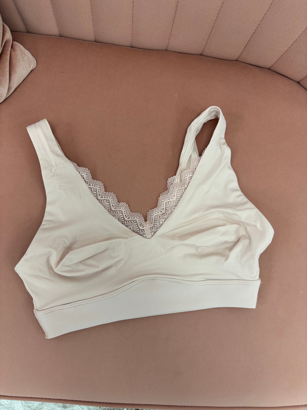 Women's blush pink pull over seamless bralette with lace front flat