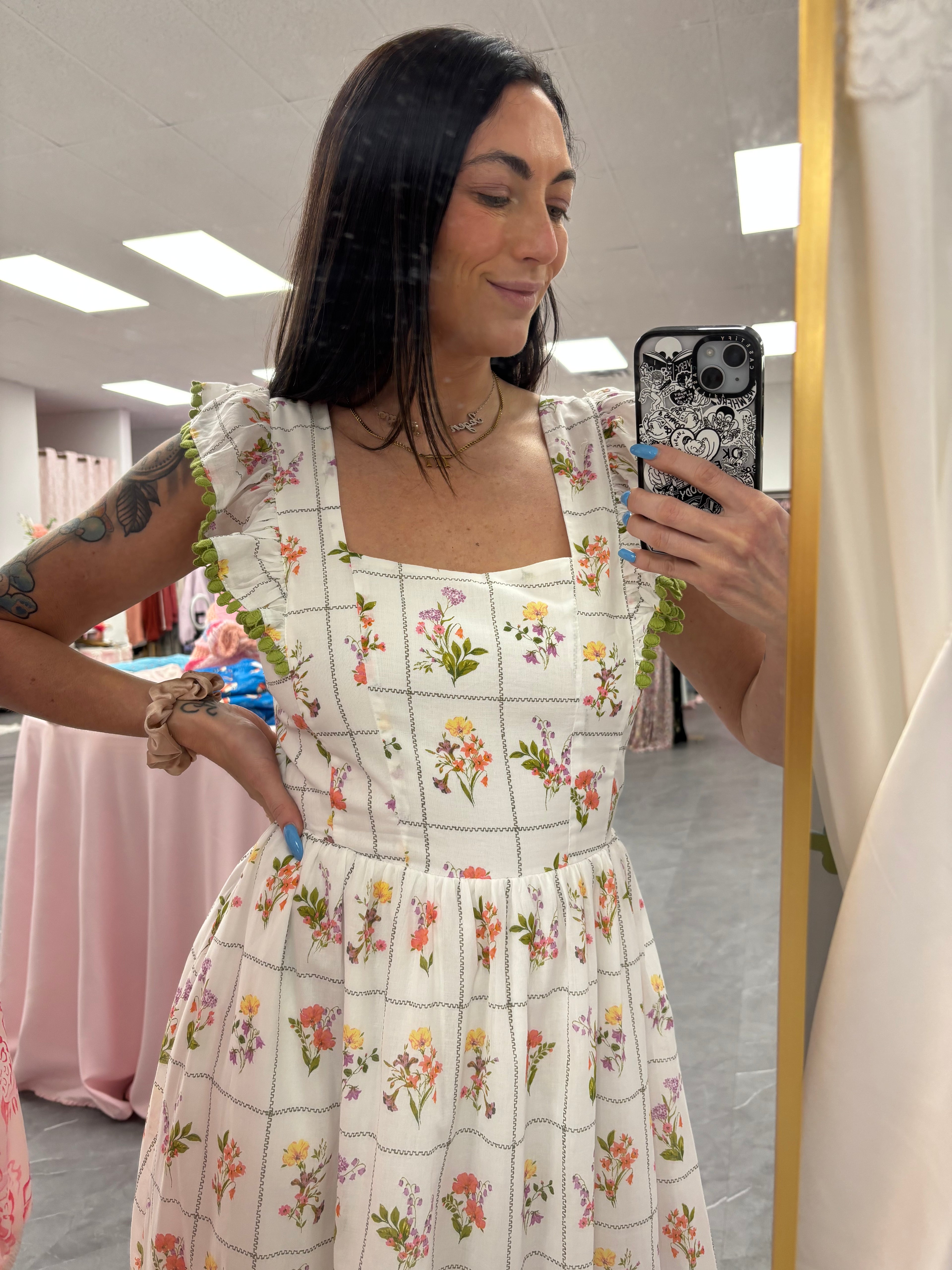 Women's foral maxi dress with back tie and pockets close up 
