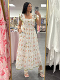 Women's floral maxi dress with back tie on model