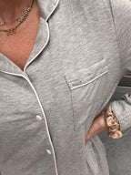 Women's grey bamboo pant pajama set button up top with white piping buttons and pocket