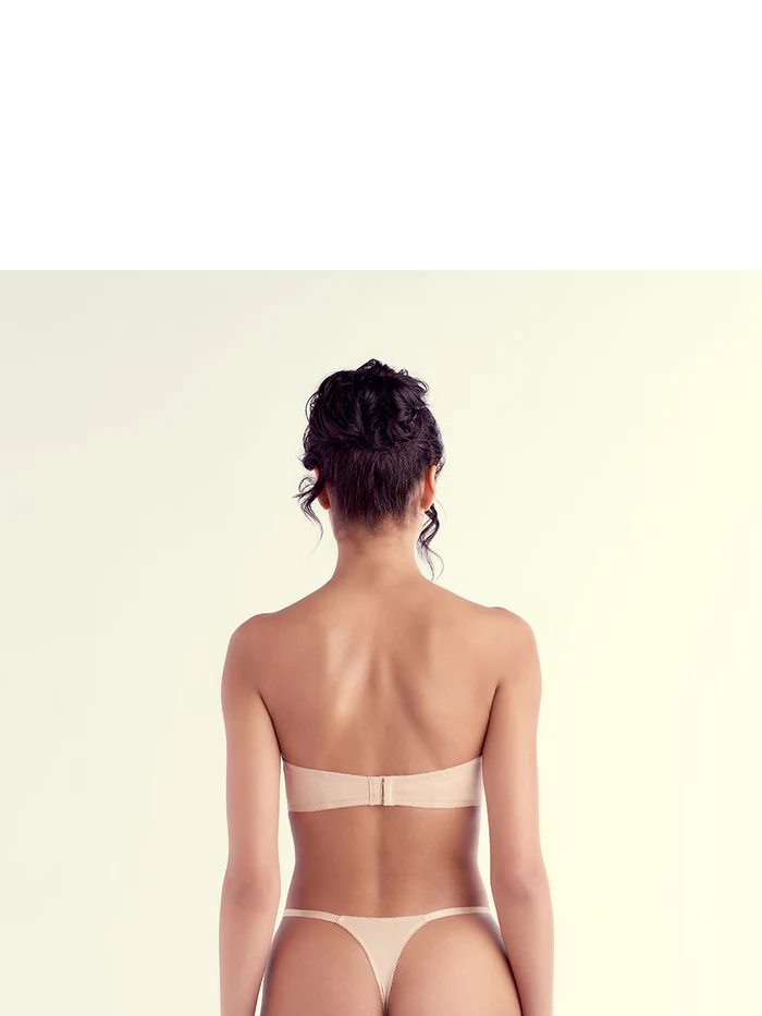 Women's The Little Bra Company strapless bra beige with removable straps back view model