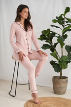 Women's pink bamboo pant pajama set with black piping buttons and front pocket