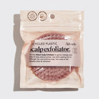 A terracotta-colored scalp exfoliator with soft, flexible bristles, designed for gentle scalp massage and hair detangling.