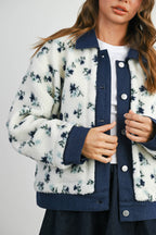 Women's white and blue floral button up jacket with pockets