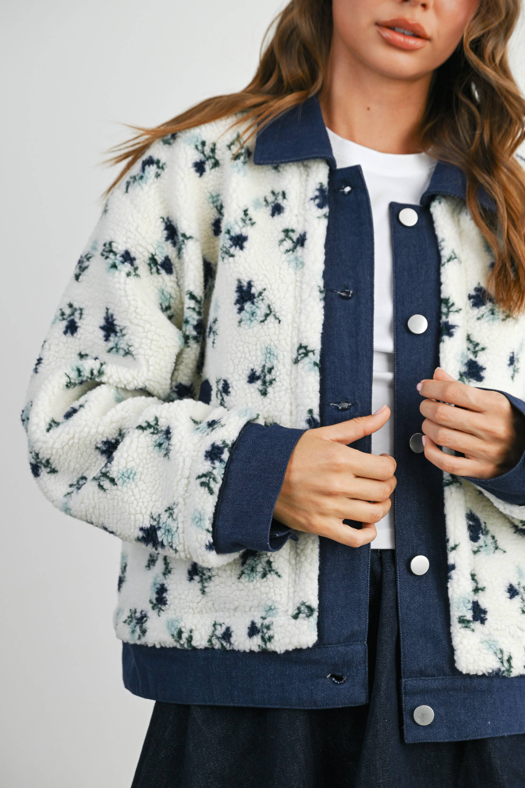 Women's white and blue floral button up jacket with pockets