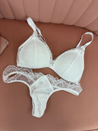 Women's white lace bridal triangle bra with matching thong