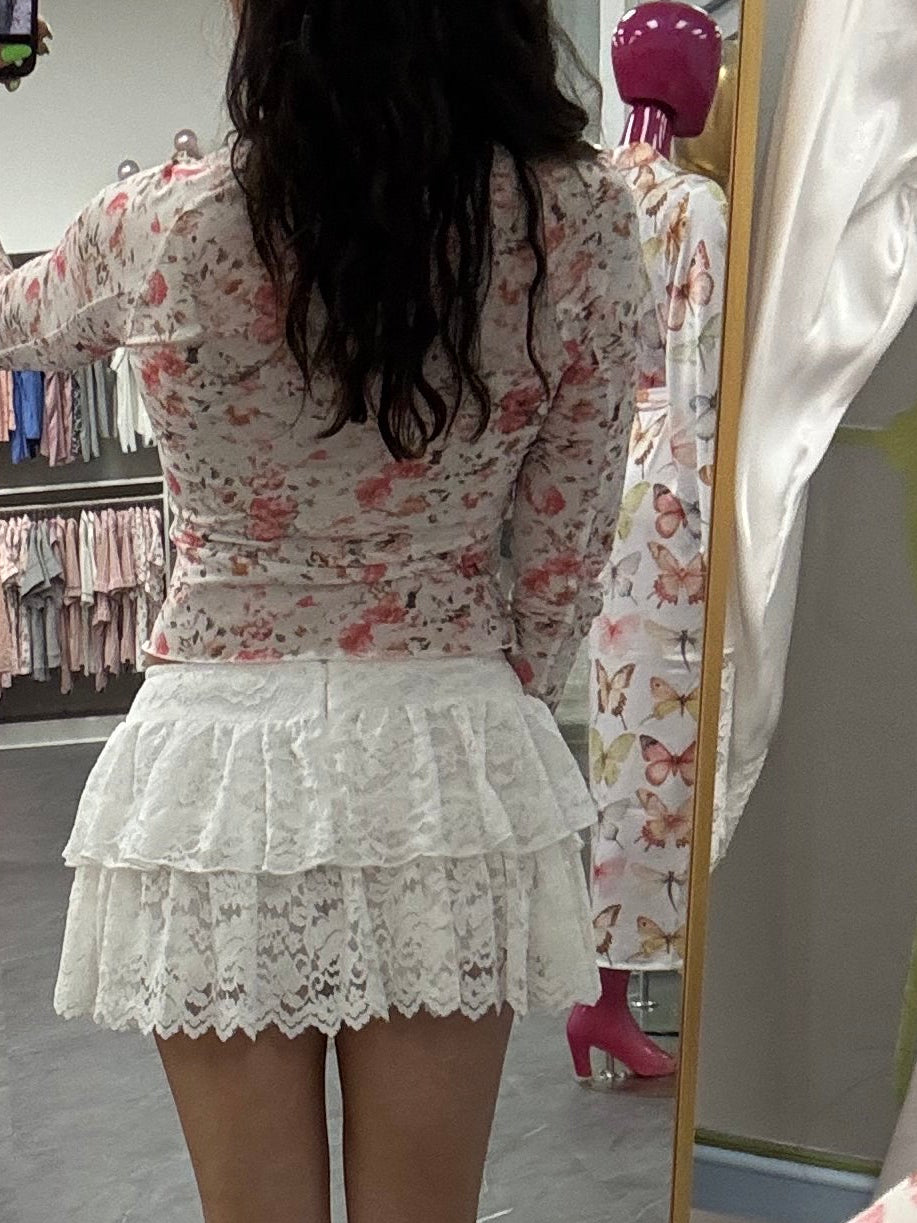 Women's white lace ruffle skort on model