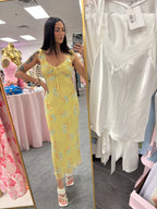 Women's yellow maxi dress with pink and blue floral pattern sweetheart tie neckline
