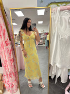 Women's yellow maxi dress with pink and blue floral pattern sweetheart tie neckline