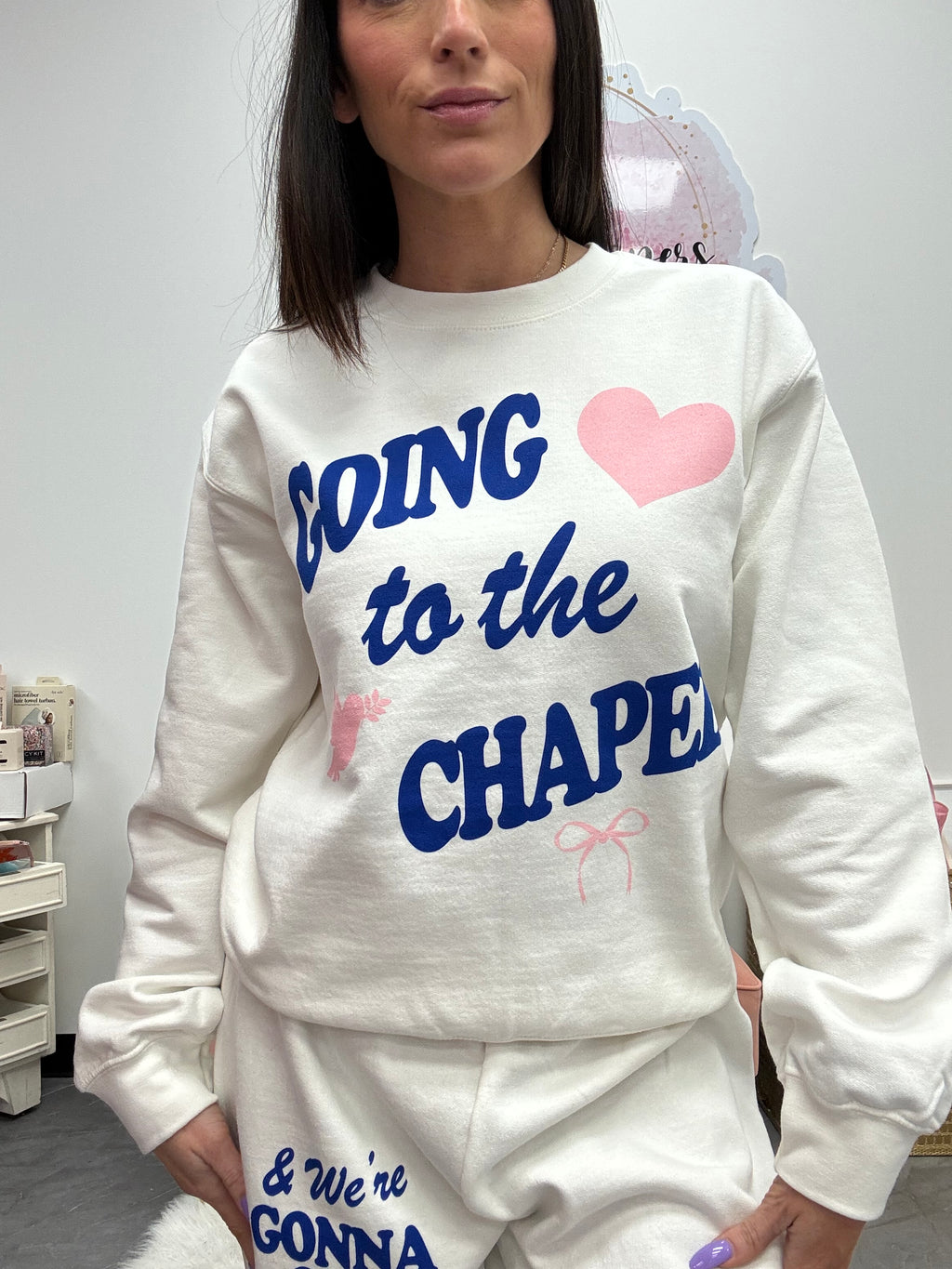 white crewneck sweatshirt with "going to the chapel" bridal 